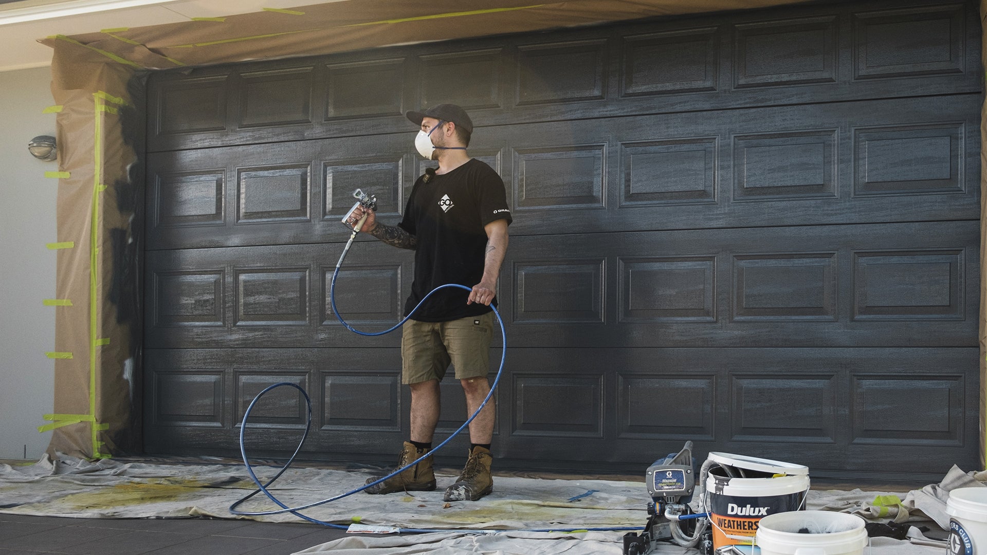 Load video: How to Spray Garage Doors
