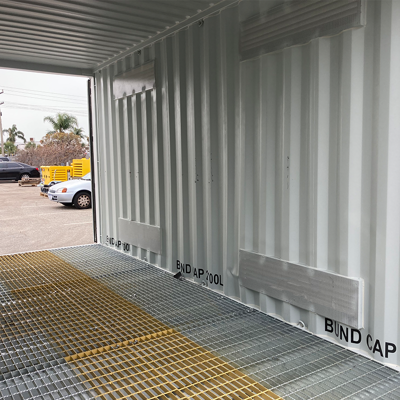 DG Store 6M Long Open Side Dangerous Goods Container Two opening end doors showing bunded non spark grated floor and ventilation
